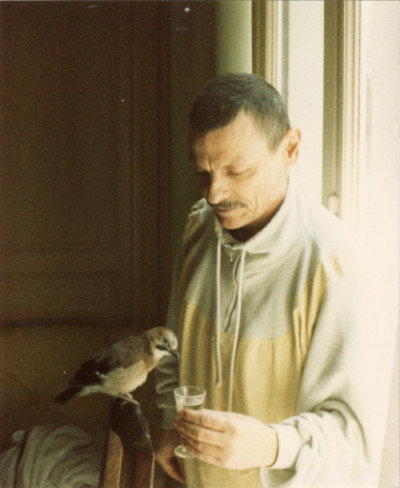 Andrei Tarkovsky with Tishka, an injured bird adopted by his family. 8 June 1986. Photograph © Irina Brown 1986.